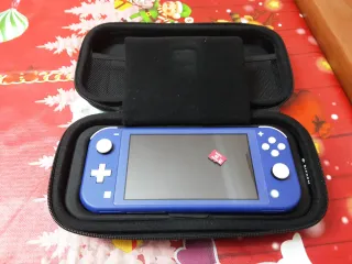 Nintendo Switch Lite Azul con extras.