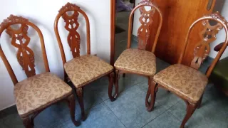 Juego de 4 sillas de comedor de madera tallada
