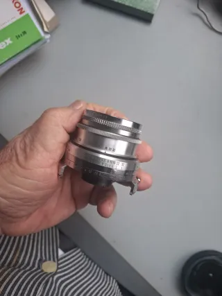 Voigtländer Dynaron 100 mm. + parasol especifico