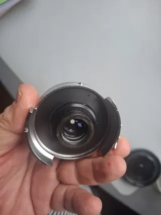 Voigtländer Dynaron 100 mm. + parasol especifico