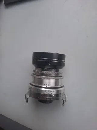 Voigtländer Dynaron 100 mm. + parasol especifico