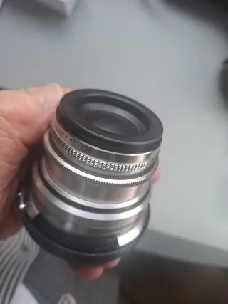 Voigtländer Dynaron 100 mm. + parasol especifico