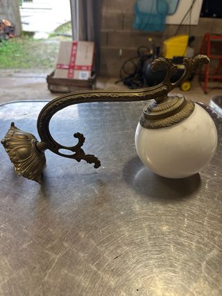 Lámparas de pared antiguas doradas