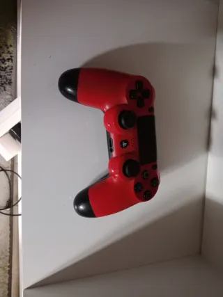 PS4 Slim Nera + 5 Giochi + Controller Rosso