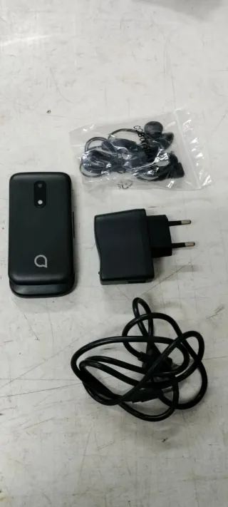 Teléfono móvil negro tipo concha