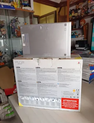 PS2 Plata Satinado + Juegos y Accesorios