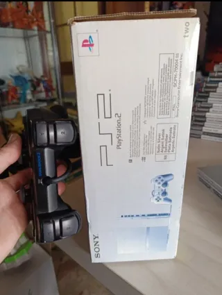 PS2 Plata Satinado + Juegos y Accesorios