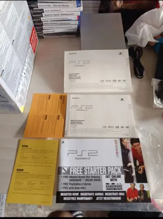 PS2 Plata Satinado + Juegos y Accesorios