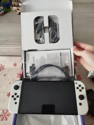 Nintendo Switch OLED + Funda transporte