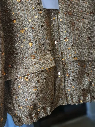 Cazadora bomber dorada lentejuelas