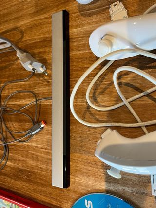 Nintendo Wii con 4 mandos y 4 juegos