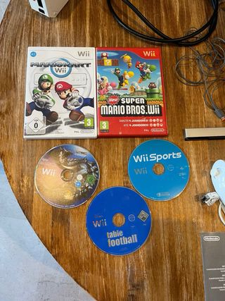 Nintendo Wii con 4 mandos y 4 juegos