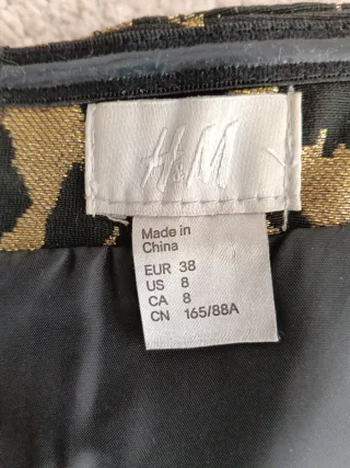 Vestido fiesta H&M T.38 negro/dorado