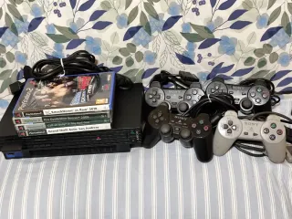 Console PlayStation 2 nera + 4 giochi + 4 controller