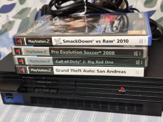Console PlayStation 2 nera + 4 giochi + 4 controller