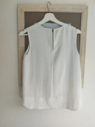 Blusa blanca Sfera volante