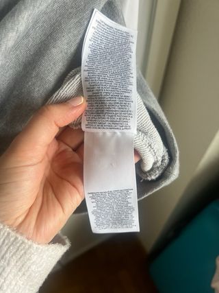 Sudadera Nike gris y blanca mangas camisa