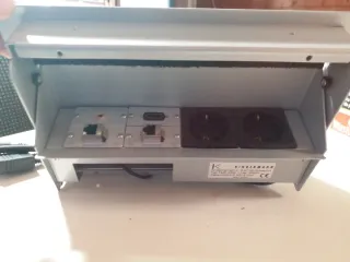 Protector de enchufes gris