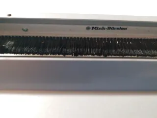 Protector de enchufes gris