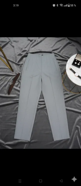 Pantalón gris de pinzas talla XS