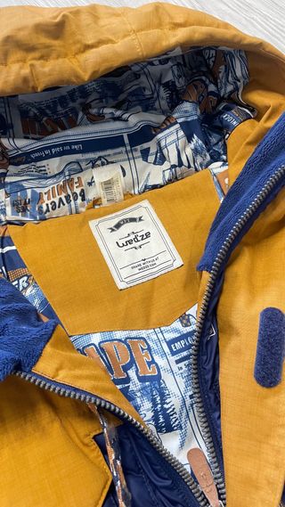 Cazadora acolchada invierno azul y amarilla