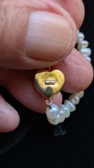 Coyar perla blanca y oro 18 kilates esté coya es a