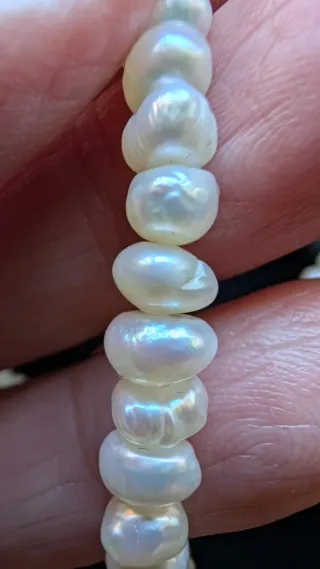 Coyar perla blanca y oro 18 kilates esté coya es a