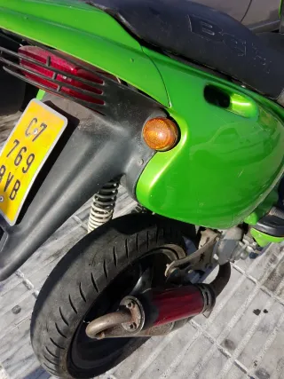 Moto Verde Beta pero no hay seguro