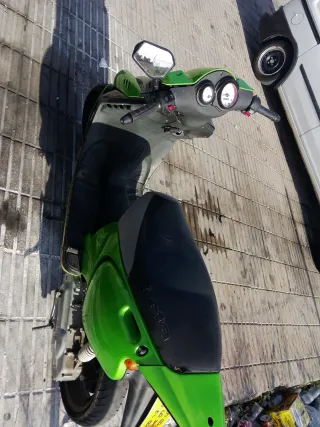 Moto Verde Beta pero no hay seguro