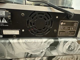 Reproductor DVD LG con Varios DVDs