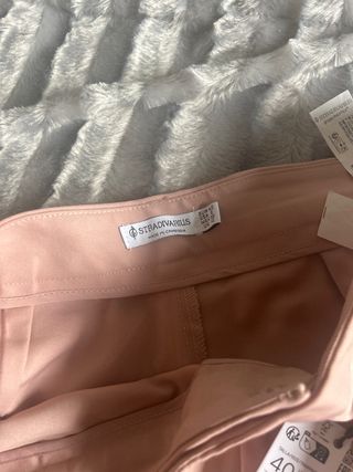 Pantalón rosa de pinzas talla L