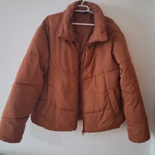 Plumifero color teja