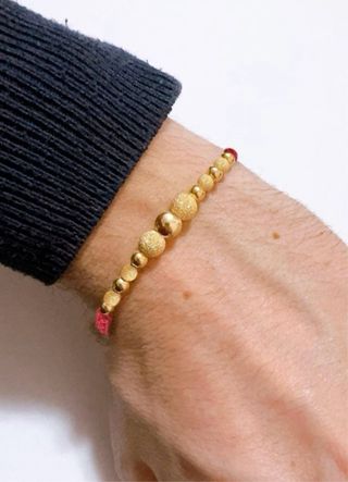 Bracciale marinaio di stoffa in oro giallo 18kt
