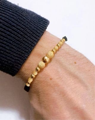 Bracciale marinaio di stoffa in oro giallo 18kt