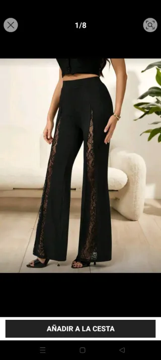 Pantalón negro acampanado con puntilla