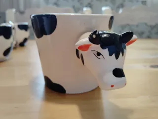 Juego de 5 tazas y dos jarras