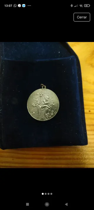 Medalla antigua de plata