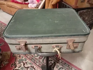 Valigia vintage verde