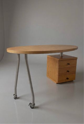 Mesa escritorio ovalada con cajonera