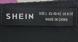 Blusa fiesta con brillos. Talla L. Shein.