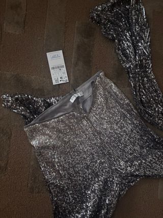 Pantalón flare lentejuelas gris y plata