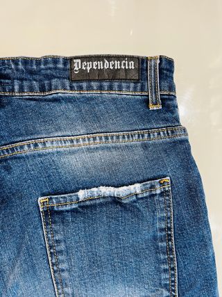 Jeans  uomo taglia 50 strappati