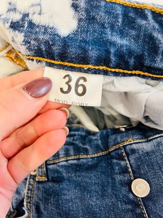 Jeans  uomo taglia 50 strappati