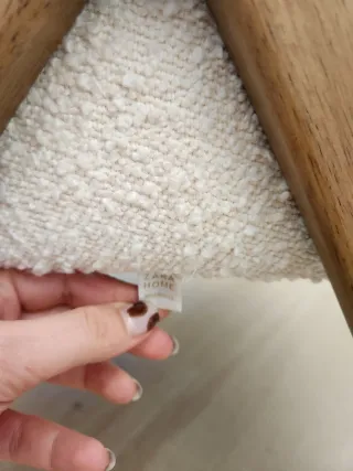 Sillón Zara Home borreguito blanco y madera.