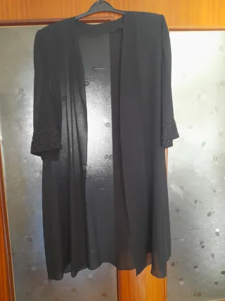 Vestido elegante mujer con chaqueta