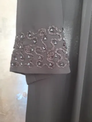 Vestido elegante mujer con chaqueta