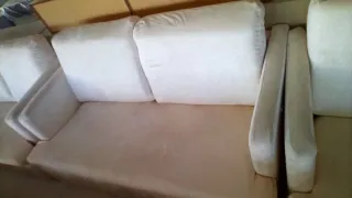 Sofá cama beige y blanco de tela