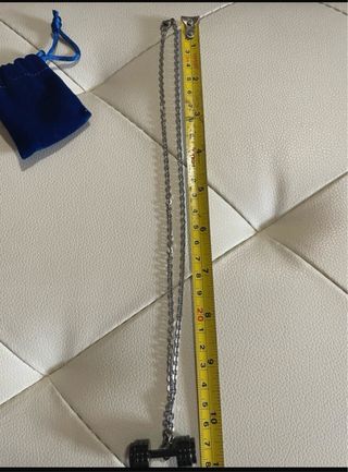 Collana con ciondolo pesetto