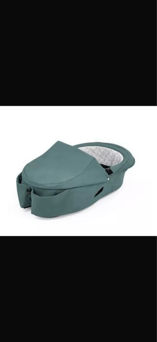 Silla Stokke Xplory verde + capazo y saco