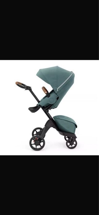 Silla Stokke Xplory verde + capazo y saco